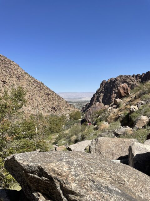 Tahquitz canyon hike landscape with a view of Palm Springs in the distance
