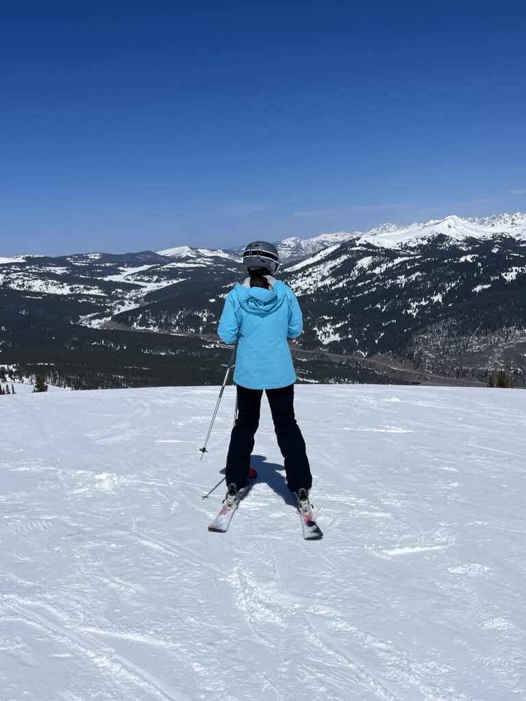 Me, nervously looking over the edge of a ski slope
